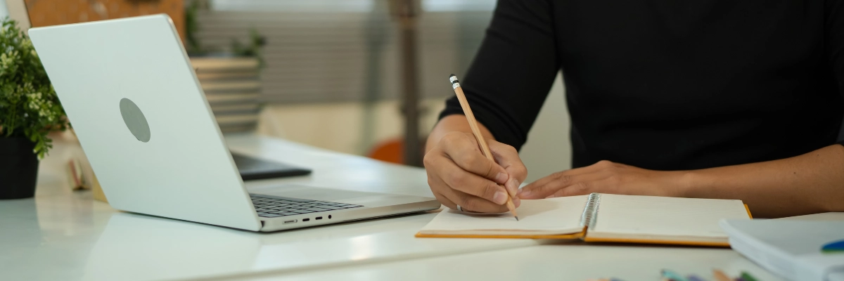 EDSS Wills and Probate Solicitors - The Hidden Risks of DIY Wills - Man making notes when making a will - Banner